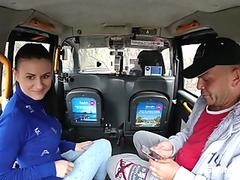 Sexy brunette accepted a dirty offer from a taxi driver